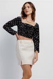 Buying Guide: Stylish and Healthy Dresses 2023 | Fashionably Fit | Black Cream Polka Dot Velvet Ruched Crop Top