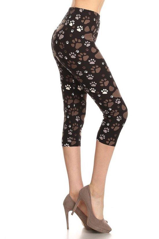Paw Printed, High Waisted Capri Leggings In A Fitted Style With An Elastic Waistband. Naughty Smile Fashion